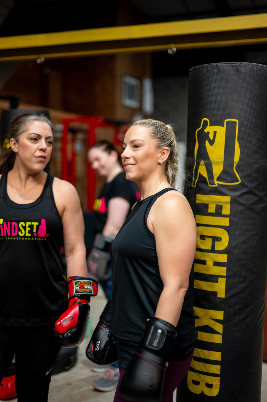 Members in Mindset kit at the Fight Klub punch bag